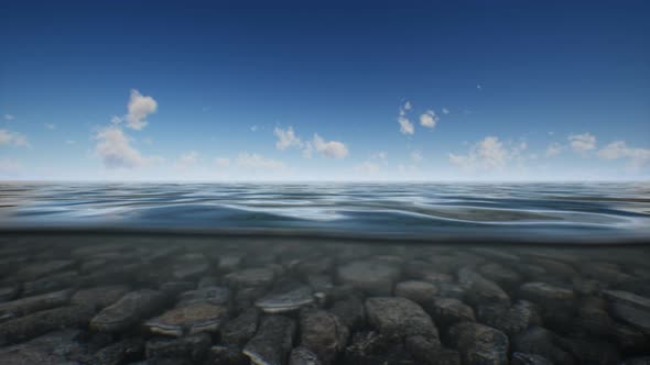 Ocean Seascape with Sky and Ocean Wave Splitted By Waterline to Underwater Part