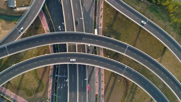 Top View to the Cars Driving on Multilevel Highway on the Sunset