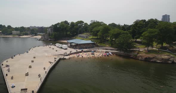 People on the Sandy Beach Shore of Glen Island in New Rochelle