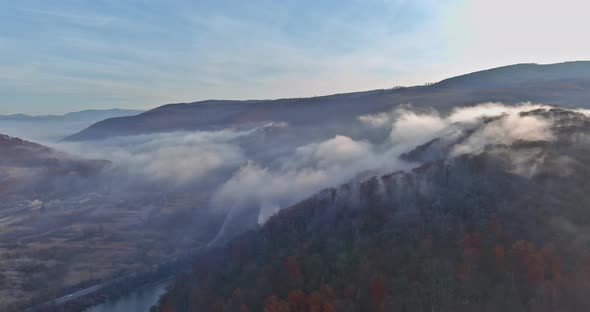 Panoramic of Autumn Natural Mountain Landscape the Fantastic Scenery with Morning Fog in Forest