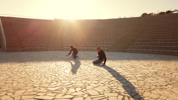 Man and woman couple dancers at outdoor theater