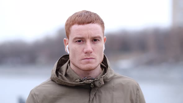 Handsome Serious Beauty Male Model Closeup Portrait Young Guy in the City Street