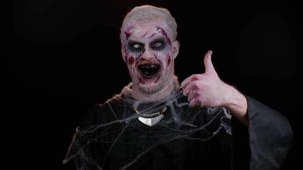 Sinister Man Halloween Zombie Raises Thumbs Up Agrees with Something or Gives Positive Reply Likes