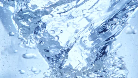 Super Slow Motion Shot of Oil and Water Blue Whirl at 1000Fps alt