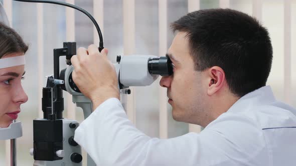 Pretty Woman Checking Her Visual Acuity