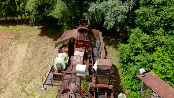 Abandoned bucket wheel excavator drone video