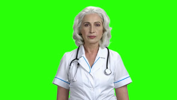 Mature Doctor Woman Looking at Camera.