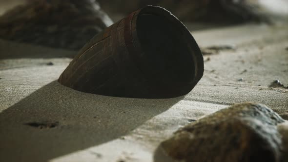 Old Wooden Barrel on the Beach alt