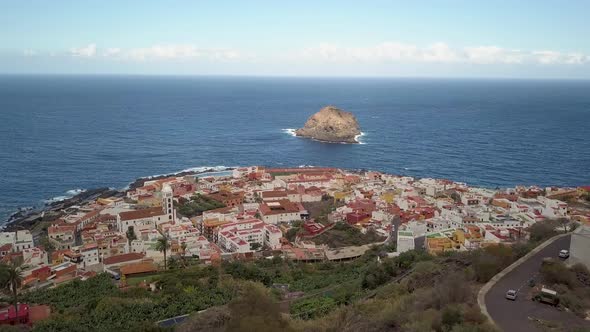 Overview of Garachico,Tenerife, from above. Roque de Garachico in the background. Camera ising towar