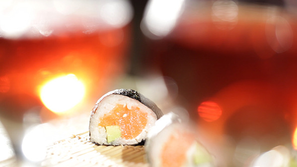 Sushi Rolls And Plum Wine 