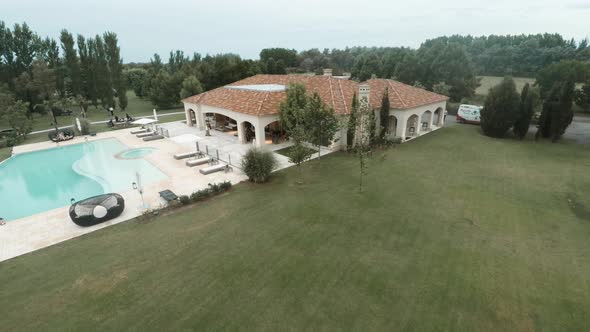 Aerial view of luxury house with swimming pool