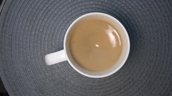 Top View on White Coffee with Milk in Mug