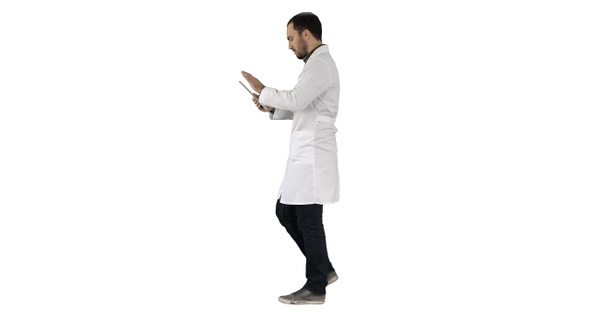 Doctor using tab while walking on white background.