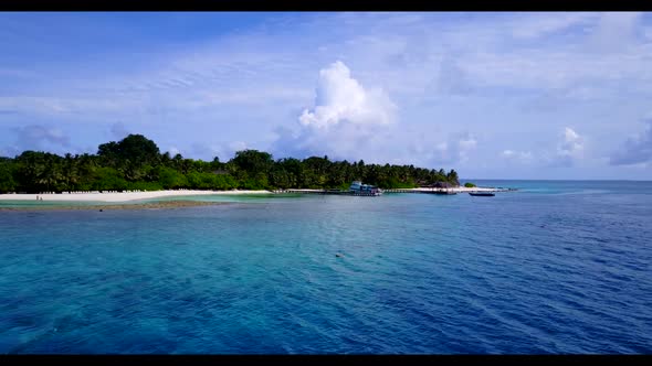 Aerial drone landscape of perfect coast beach vacation by blue sea and white sandy background of a d