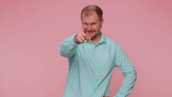 Man Smiling Excitedly and Pointing to Camera Choosing Lucky Lottery Winner Indicating to Awesome you