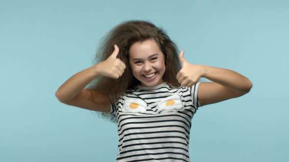 Slow Motion of Beautiful Curvy Woman with Wavy Hair Jumping From Bottom and Appear on Blue