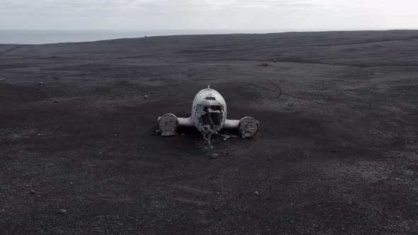 Aerial of an Abandoned Crashed Plane Wreckage on Solheimasandur Beach Iceland