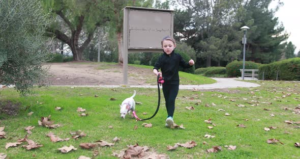 She Walks Dog At Park