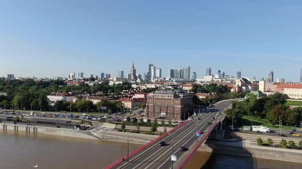 Flying over a bridge at Vistula river towards the Warsaw downtown, Poland