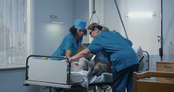 Male Patient Using Crutch in Hospital