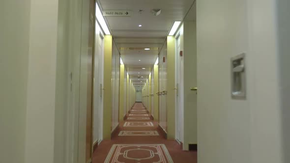 Moving in Hotel Corridor with Light Interior