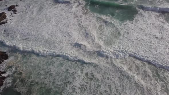 Highly aerated ocean water near shore results from robust shore break, Buffalo Bay