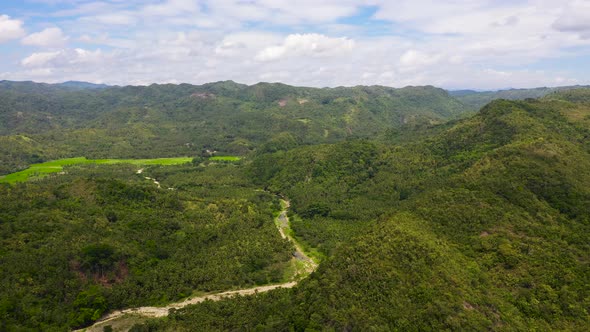 Mountain Landscape with Clouds. A River in the Mountains on Leyte Island, Philippines.