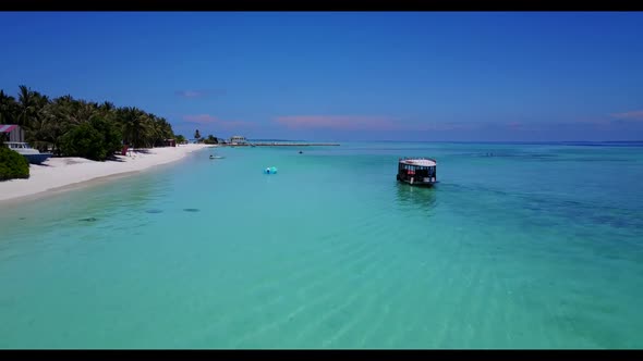 Aerial flying over travel of beautiful lagoon beach adventure by aqua blue lagoon with clean sandy b