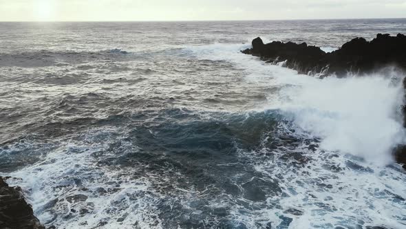 Waves Crashing Against Rocks in Easter Island.