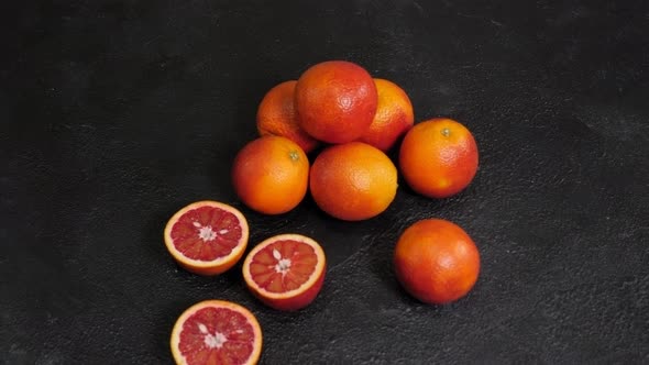 Ripe Sicilian Oranges on a Black Surface