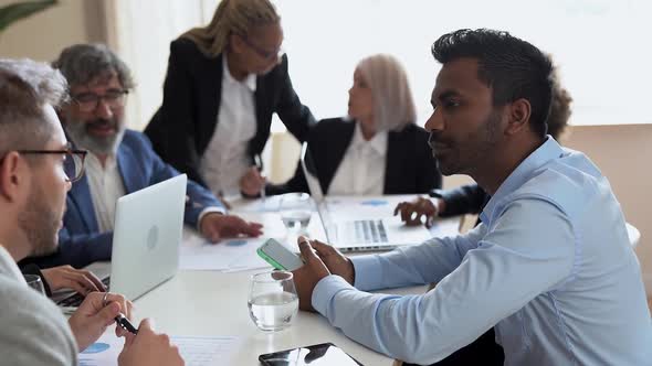 Multiracial business people working inside bank office - Team meeting concept