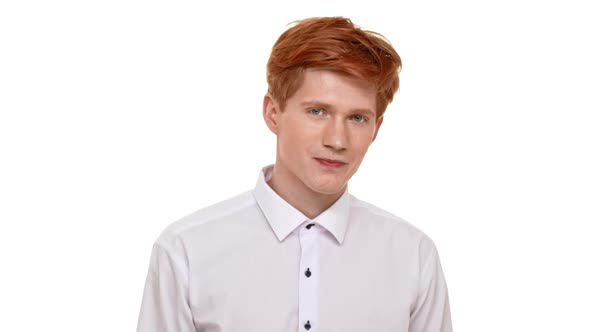 Confident Young Handsome Ginger Caucasian Young Man Pointing on Camera on White Background and