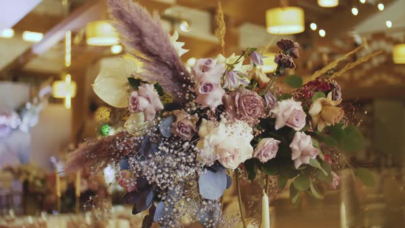 A Serving Tables Decorated with a Bouquet of Flowers Slow Motion