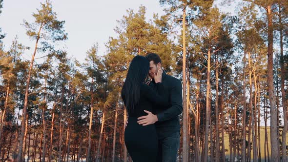 The Charismatic Couple Perfect Isolated in the Meadow Surrounded By Trees