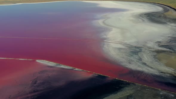 Beautiful top view of the salty, pink lake. Beautiful pink sunrise.