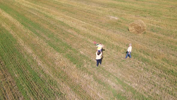 Happy Family Playing Ball Outdoors Aerial View