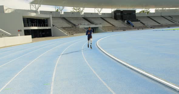 Disabled athletic running on a running track 4k