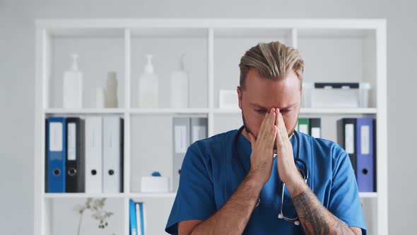 Professional medical doctor in hospital office, Portrait of young and confident physician.