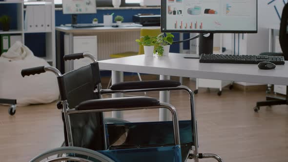 Wheelchair for Handicapped Employees Placed Inmodern Empty Workspace