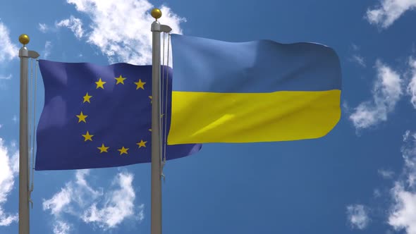 European Union Flag Vs Ukraine Flag On Flagpole