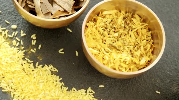 Various spices in bowl with yellow rice 4k