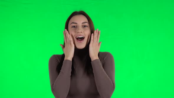 Attractive Girl with Shocked Wow Face Expression. Green Screen