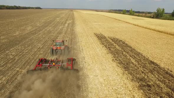 Tractor Preparing Land for Sowing, Aerial Shot, Field Corn