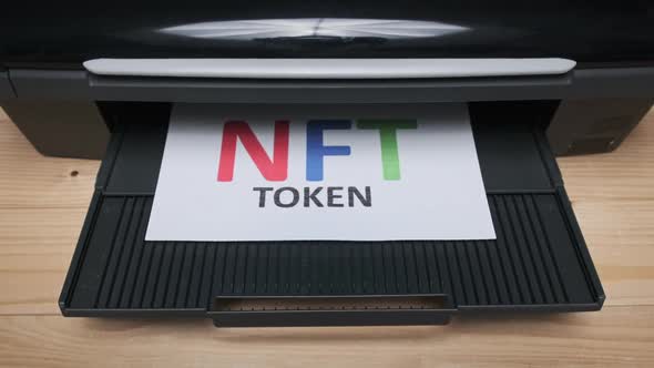 NFT Token Printing Inscription on White Sheet of Paper Printed By a Jet Printer