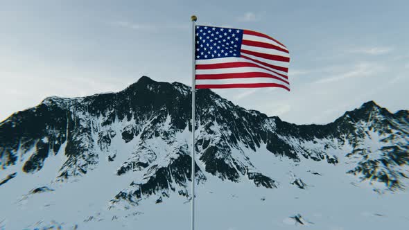 American flag above the snowy mountains. 4K Aerial View