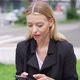 Businesswoman Using Smartphone on Street - VideoHive Item for Sale