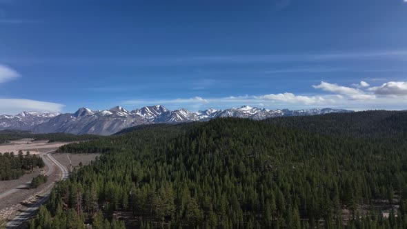 Mountain Range With Evergreens Pull Away Fast