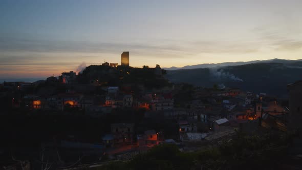 Tower and Medieval Village of Condojanni in Calabria After Sunset