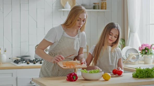 Caucasian Middleaged Family Mother and Girl Teenager Child Daughter Preparing Fresh Healthy Tasty