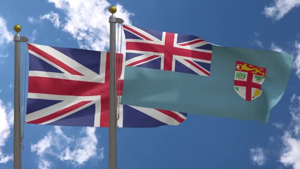 United Kingdom Flag Vs Fiji Flag On Flagpole